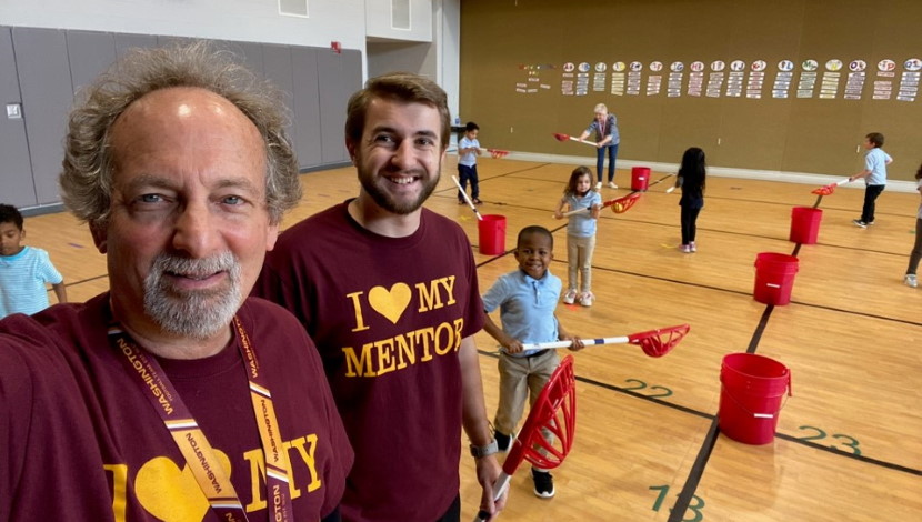 Mentor and Student in a gym class