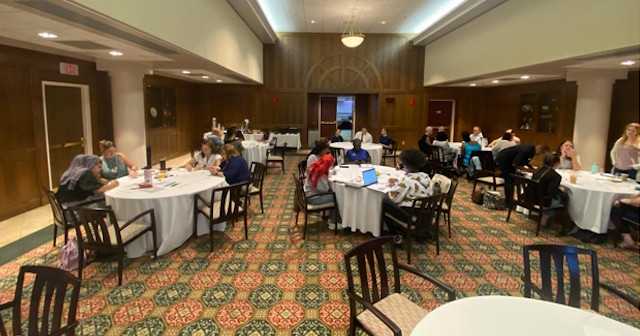 Staff and students at event