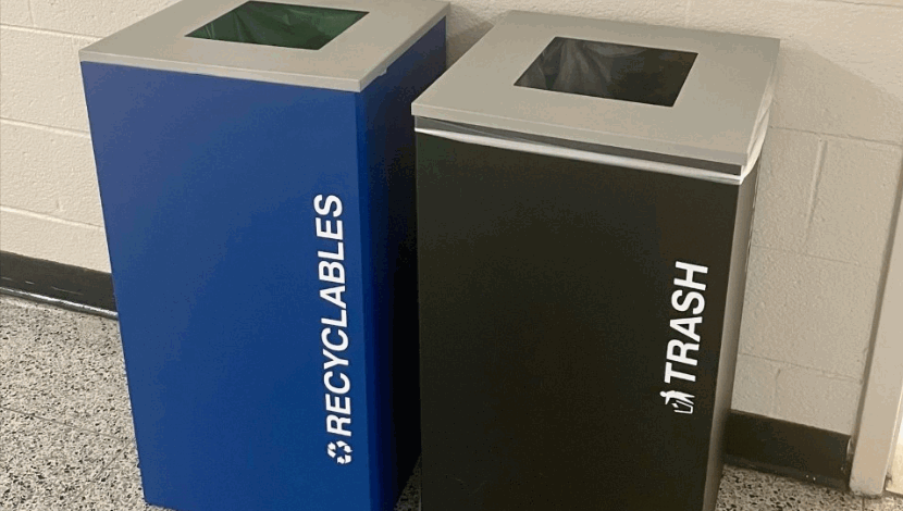 Recycling bins in a hallway on campus