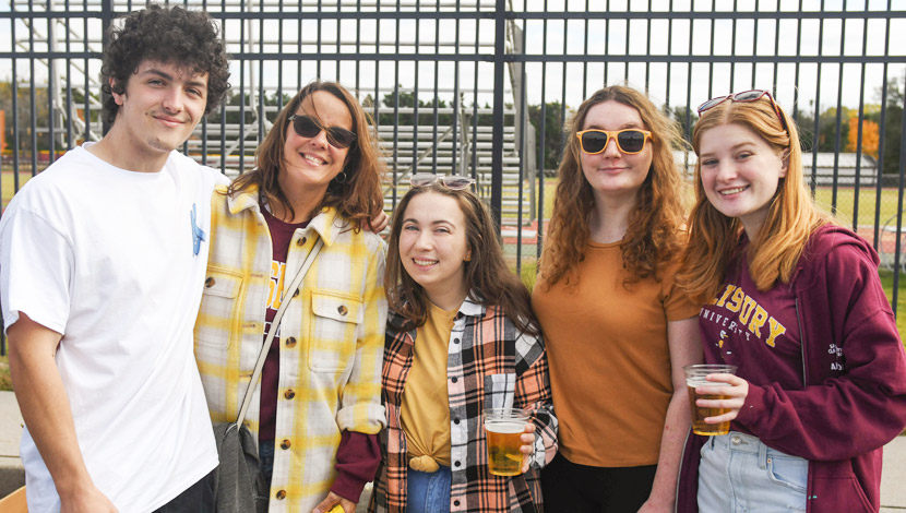 graduates at homecoming event