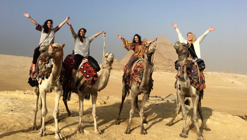 Group of student on camels during Study Abroad
