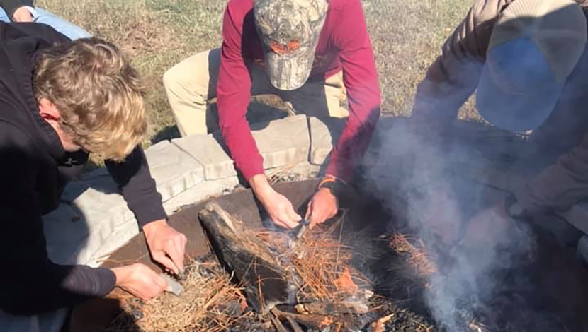 Students with campfire