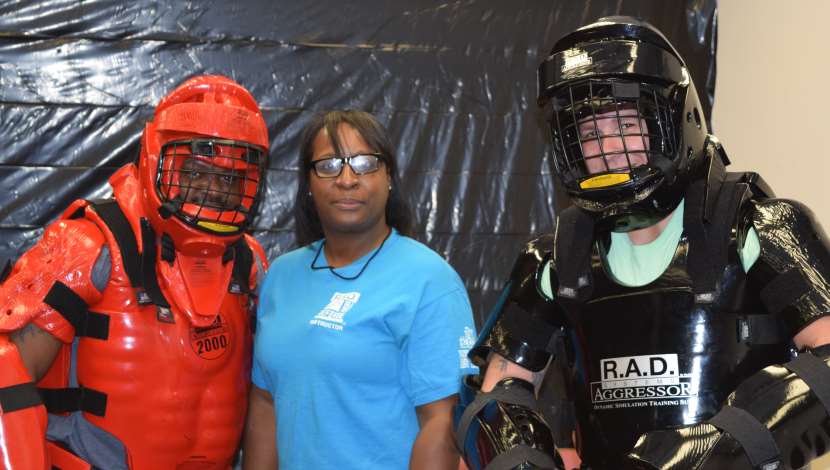 Three RAD instructors pose for group photo